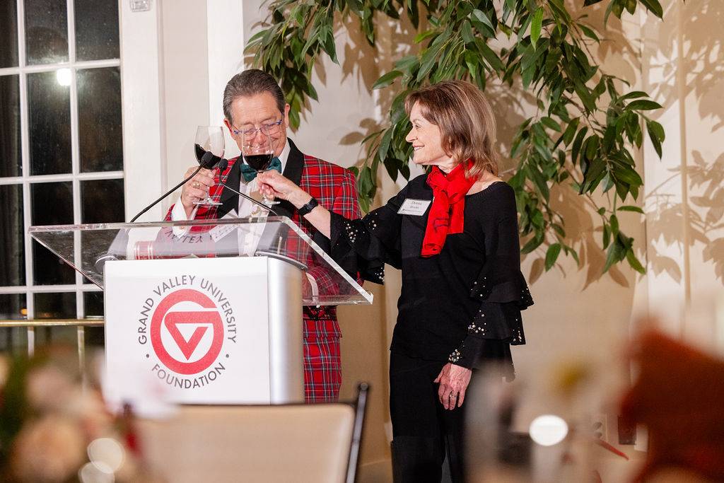 Jim and Donna Brooks giving toast at Annual Party